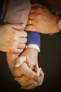 image of holding hands